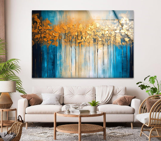 The abstract gold leaf forest glass wall art features an abstract design with a gold leaf motif and vibrant colors making it a striking forest wall art and elegant glass decor option on a wall