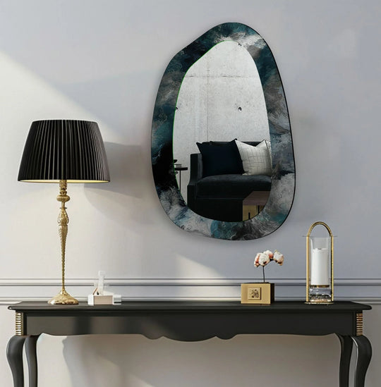 This asymmetric mirror features an abstract green and teal design reflecting a room ideal as a large bedroom wall mirror
