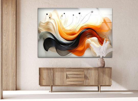 A textured stone vase with a white sculptural accent rests on a wooden cabinet below abstract orange, black, and cream glass wall art.