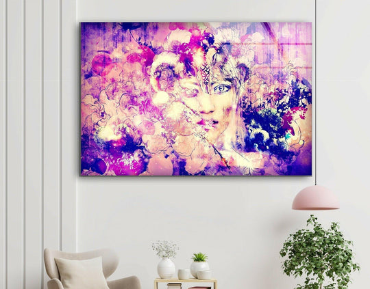 A vibrant abstract painting woman glass wall artwork features cool, deep purple and pink hues with a striking, cool color temperature.