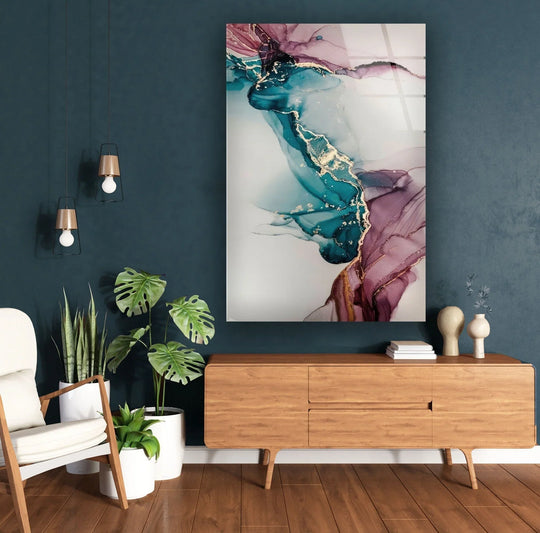 Abstract pictorial art from glass showcasing a vibrant transition of teal, purple, and gold inks.