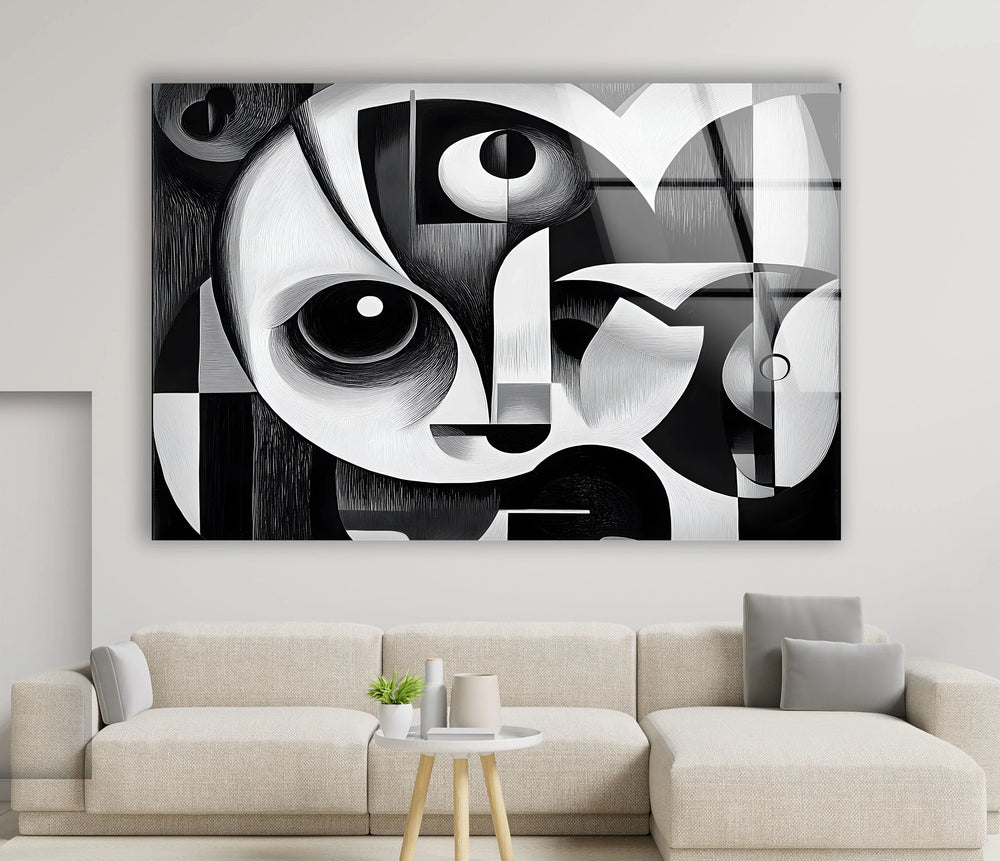 Monochrome abstract portrait on tempered glass showing fragmented facial elements in a cubist style.