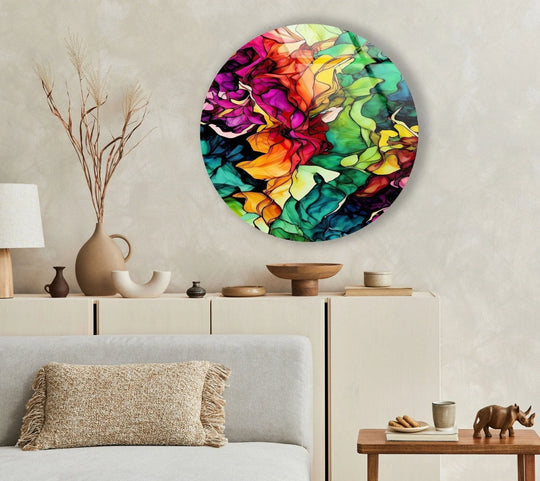 Gentle sunlight illuminates the colorful patterns of the abstract round oil art, creating a warm ambience within the room, highlighting the best glass art.