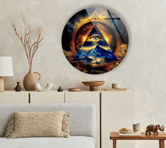 Layered effect in abstract round illuminati glass printing emphasizes the circular wall art's mesmerizing illuminati eye and mountain design.