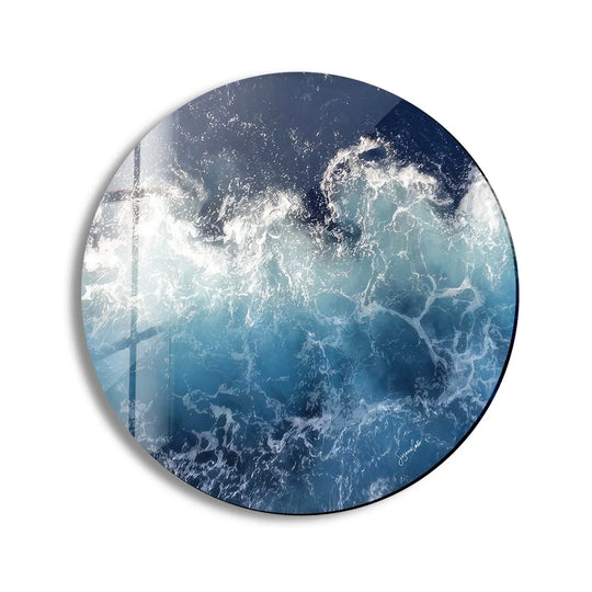 High-quality wall art prints are achieved on this abstract round ocean waves glass wall art, demonstrating a polished finish and vibrant color depth.