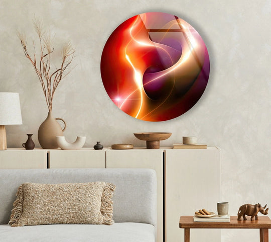 The stillness of the room is enhanced by the abstract round red and yellow glass art that seems frozen in a luminous swirl of color, a mesmerizing piece of glass art.