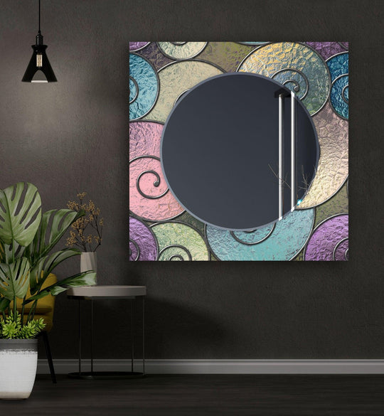 Abstract spiral wall mirror features colorful textured spirals surrounding a dark gray round reflective element a unique accent