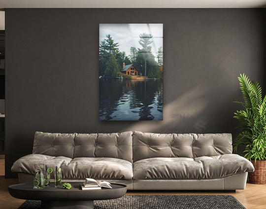 Layered reflections create depth in this lakefront cabin art from glass, showcasing a peaceful escape into nature's serene landscape.