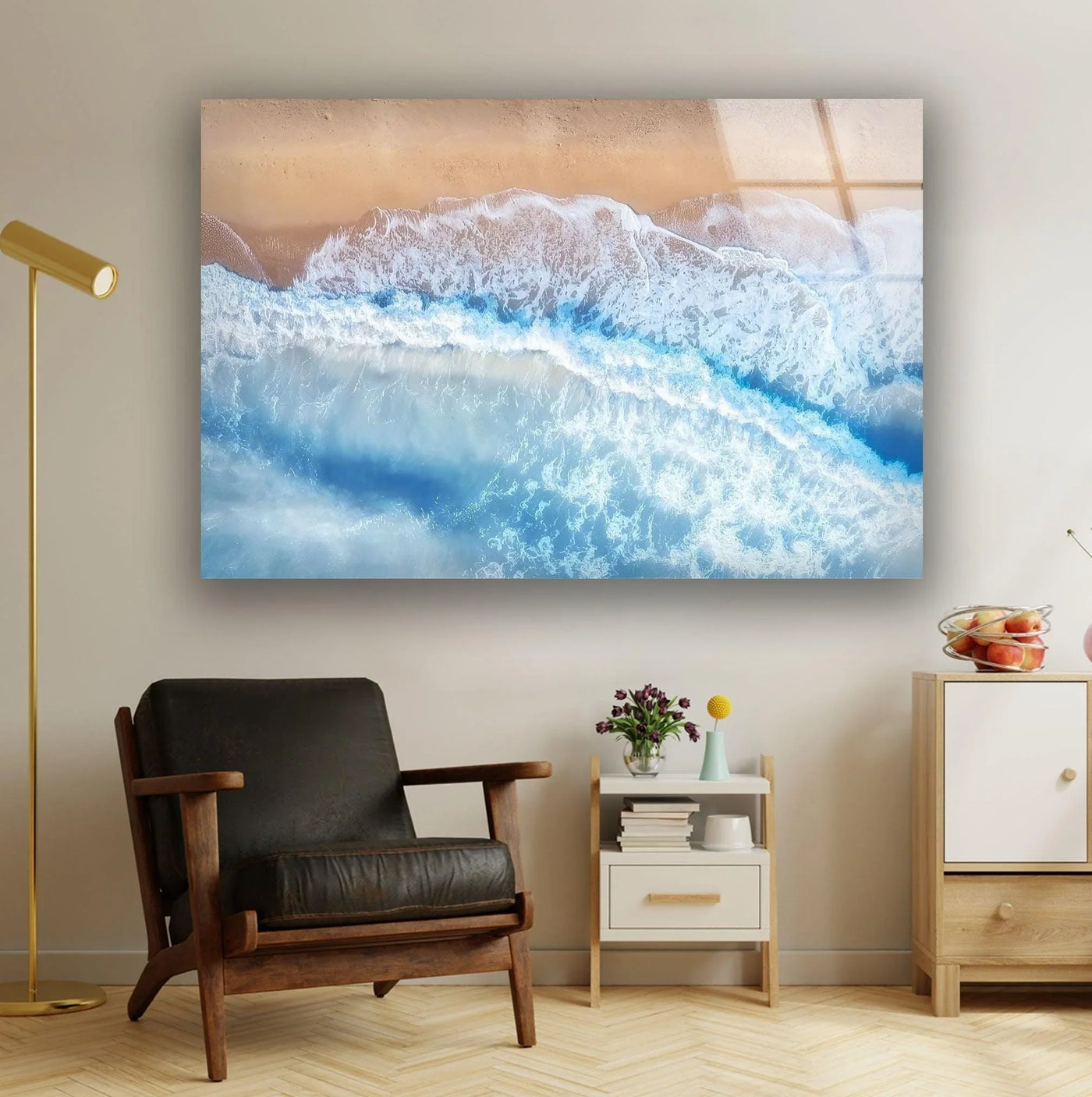 Cool color temperature highlights the refreshing, crystal-clear water meeting the warm, sandy beach in this stunning aerial view beach glass wall art decor.