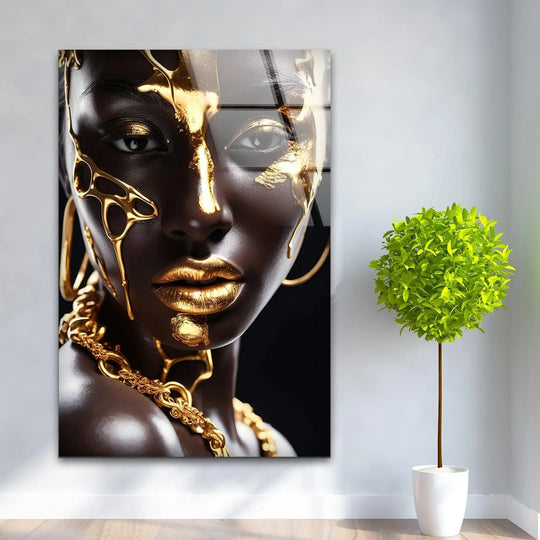 A captivating African gold woman glass wall art showcases a layered effect with melting gold accents and luxurious chains.