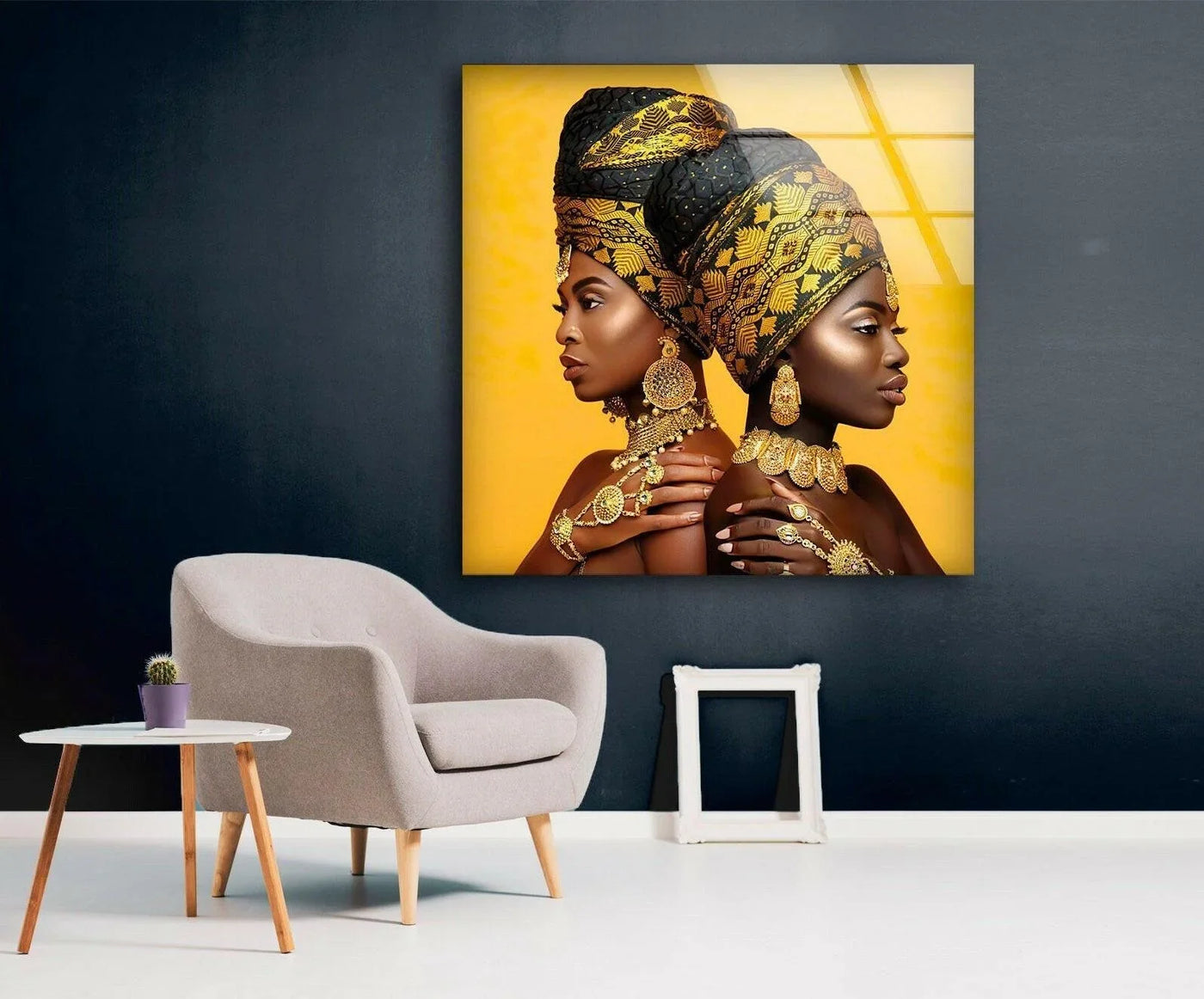 Radiant African queens in opulent gold and black attire exude powerful elegance on this striking art from glass.