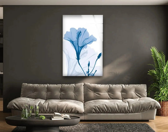 The flower glass wall art features a blue tinted hibiscus floral design and it is a hibiscus chiller wall art providing timeless serenity and modern sophistication