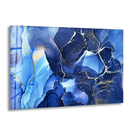 Cool blue and navy abstract glass wall artwork flows with veins of shimmering gold.