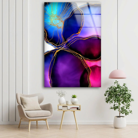 Fluid strokes of sapphire and magenta swirl with golden energy across this abstract glass wall art print, creating a vibrant sense of movement.