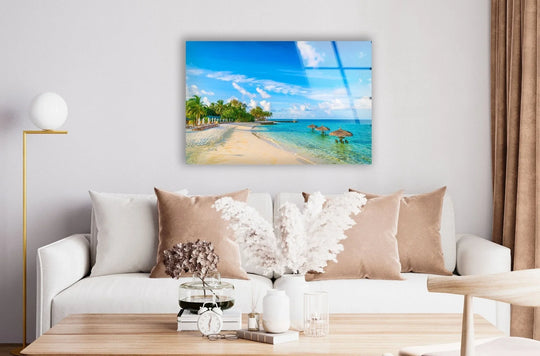 Azure hues dominate this Alimatha Island glass wall art, with bright wall prints showcasing a serene tropical beach landscape.