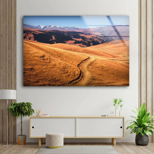 Dramatic color contrast between the warm gold hills and the cool blues of the distant snowy mountains defines these Almaty Kazakhstan landscape wall prints.
