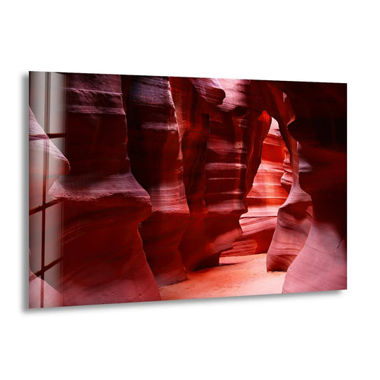 The organic forms of Antelope Canyon's red rock ravines are captured in this hanging wall art, showcasing nature's artistry with its undulating stone shapes.