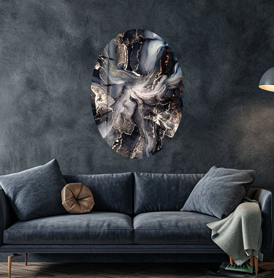 An abstract, moody hanging wall art with smoky black and gold marbling creates a sophisticated ambiance.