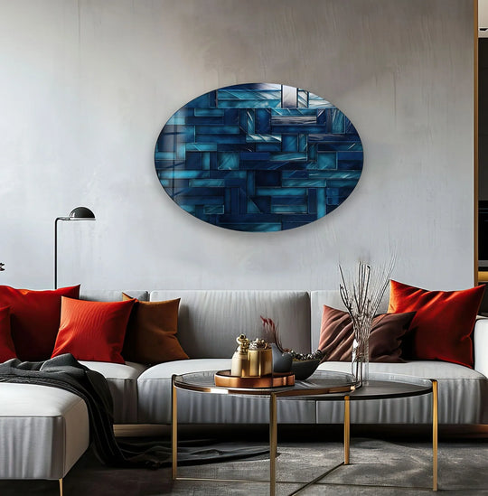 Asymmetric oval decorative wall art featuring sharp geometric lines and a vibrant sapphire blue abstract pattern.