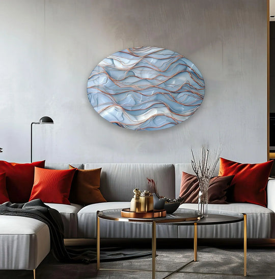 Asymmetric oval glass art painting with swirling gold and blue abstract patterns.