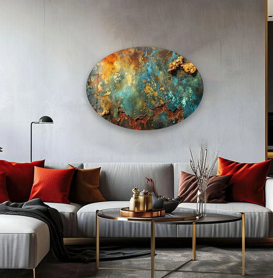 round glass art features a metallic, rusty, abstract design with textured, oxidized copper and teal hues.