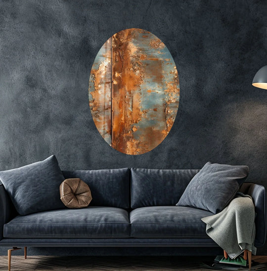 The oval asymmetric metal glass wall art features bold, saturated tones of rustic rust and aged teal, with intense color saturation.