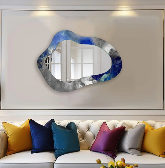 Swirling shades evoke a dynamic sense of movement across this asymmetrical blue abstract wall mirror, perfect for decorating with wall mirrors to create a focal point.