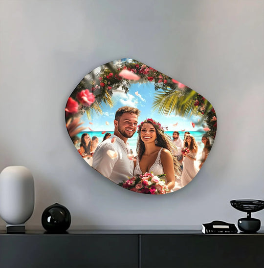 Custom pebble shape glass art features a joyful wedding couple on a beach, captured in a vibrant print on glass photo.