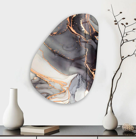 Dark marbled glass wall artwork featuring swirling black and white tones with metallic gold accents.