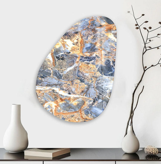 Soft, swirling blues and warm oranges create an ethereal watercolor effect on this unique glass wall art decor.