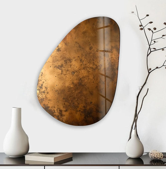 This abstract glass art piece evokes a dynamic sense of swirling motion with its textured bronze finish.