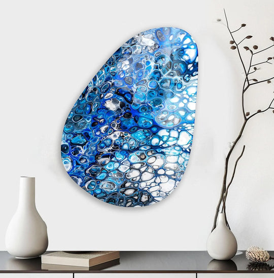 Asymmetrical oval stained blue glass wall art with a beveled edge, showcasing best glass art.