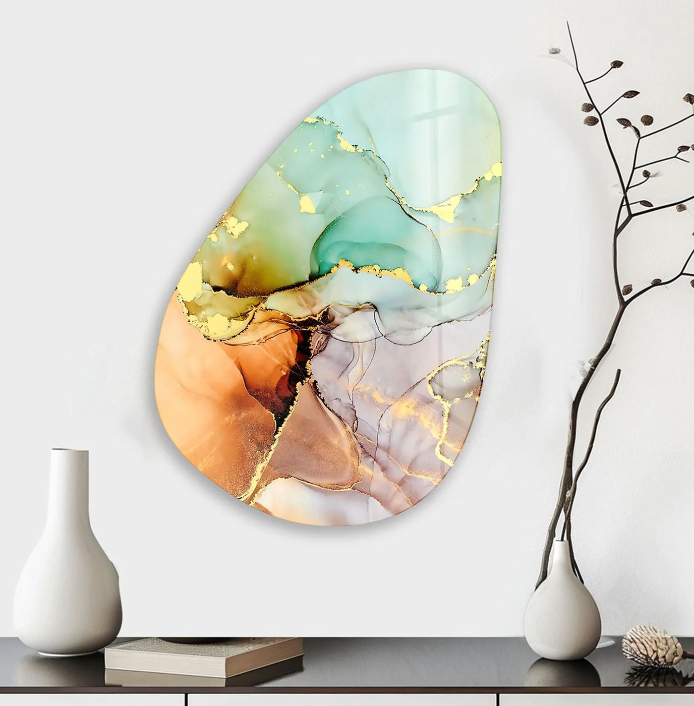 Turquoise and warm orange tones blend in this abstract glass art painting, creating a vibrant, cool to warm color temperature.