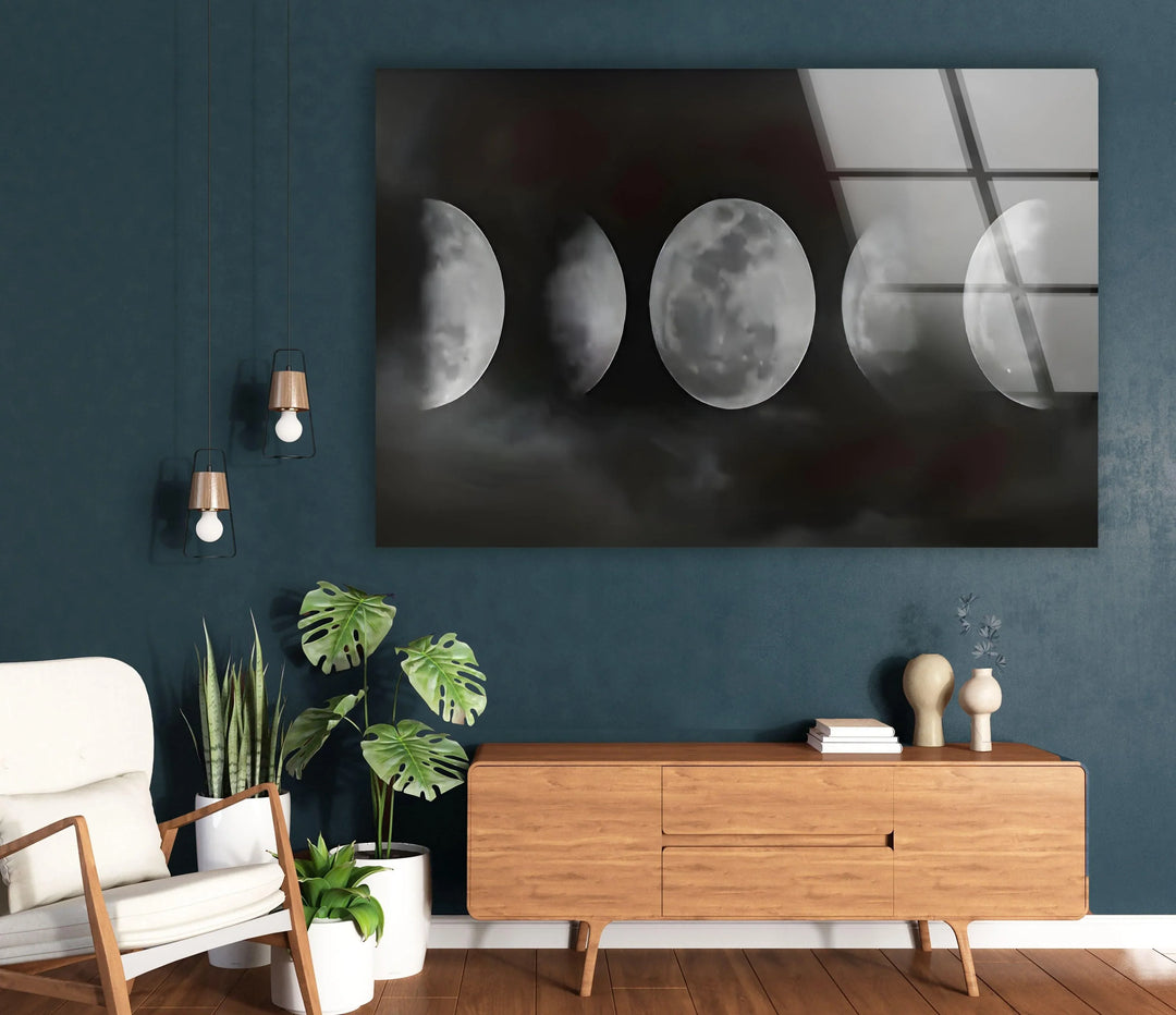 Tempered glass wall art showing moon phase progression in a dramatic cloudy night scene.
