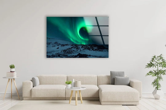 The realistic detail shows the aurora borealis glass art with the vivid, swirling green lights of the natural phenomenon over a snowy, rocky landscape.