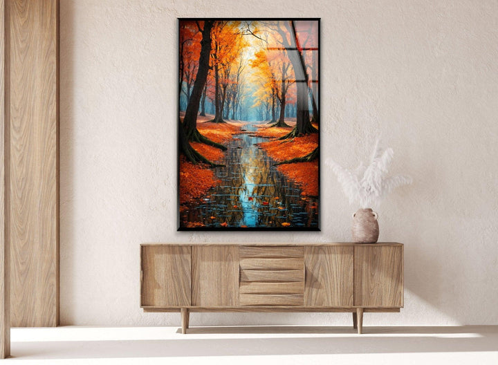 Serene autumn forest with colorful foliage and tranquil water reflections on glass.
