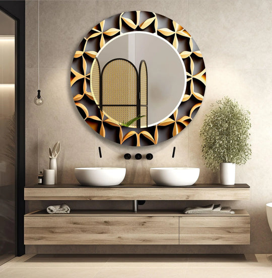 A black and gold abstract Mirror Art piece with a bold round design and patterned frame reflecting a modern bathroom interior