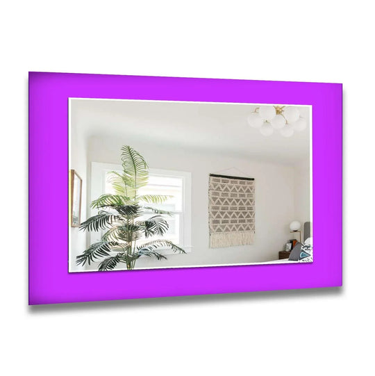 A solid colors wall mirror with a wide purple frame reflecting a bright room interior and a plant creating modern minimalist decor