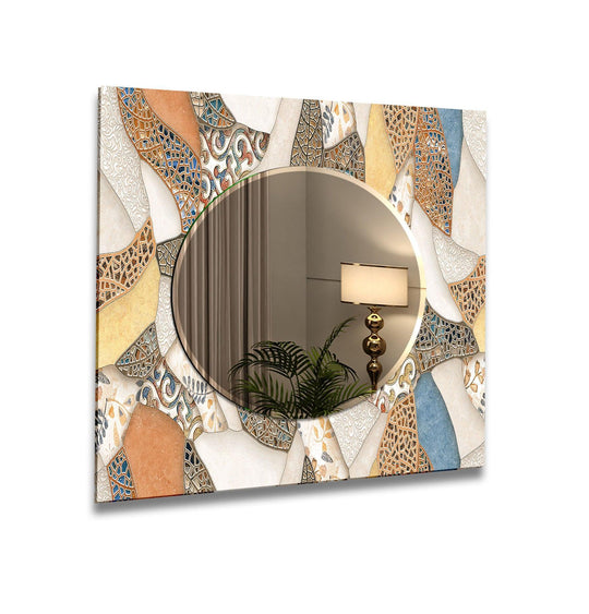 Mosaic beige and orange abstract mirror art made of tempered glass with colorful patterns reflecting a room with a plant and lamp