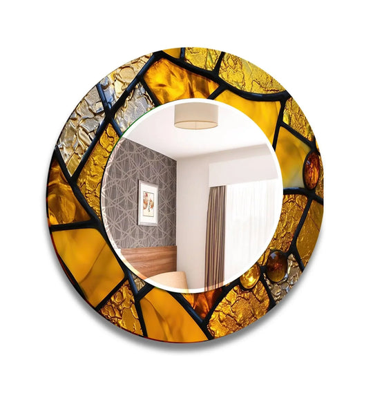 The round gold stained wall mirror features a unique pattern and elegant glass wall art and stained accents for a decorative mirror and gold decor element