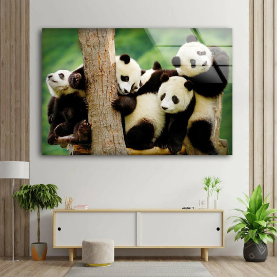 A cluster of playful pandas melts into the lush, abstract greenery on this unique modern wall decor.
