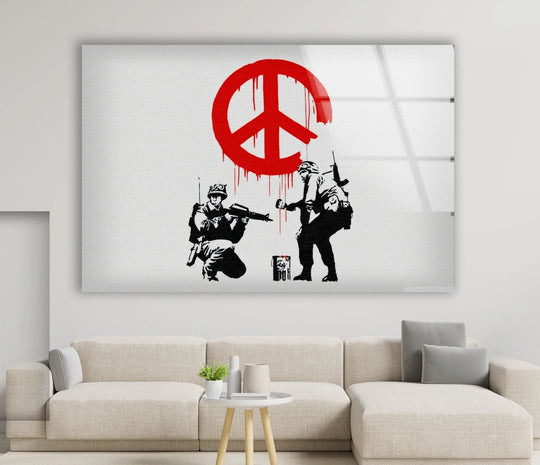 Banksy CND Soldiers Peace glass wall art shows a dripping red peace sign above two soldiers in a modern pop art and graffiti style