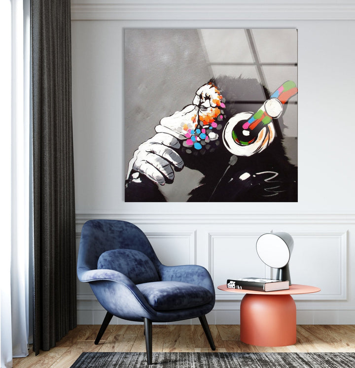 a painting of a monkey with headphones on a wall