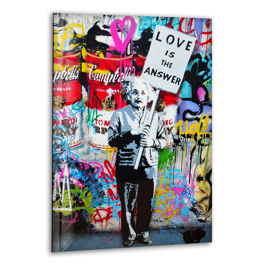 Banksy Einstein Graffiti Glass Wall Art shows Einstein with a love is the answer sign in a colorful urban wall decor style