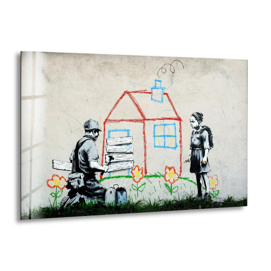 Banksy Kids House glass wall art features a man nailing boards over a chalk house with a girl watching a popular Banksy wall art print