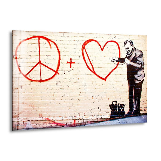 Banksy Peace and Love glass wall art shows the Peace and Love Doctor graffiti with a red heart and peace sign for modern street art decor