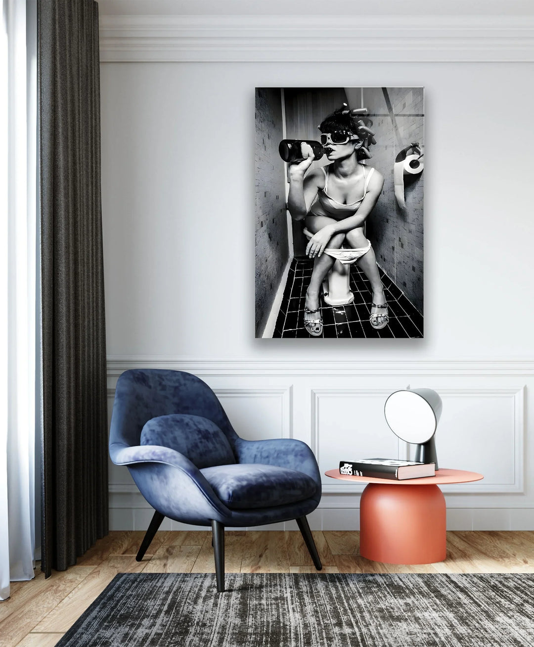 Black and white glass print featuring a playful vintage character holding a drink in a small bathroom.