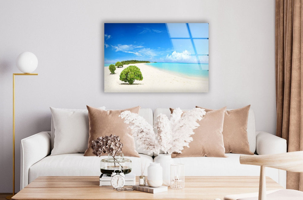 Serene coastal escape featuring a bright sandy beach, lush greenery, and crystal-clear ocean.

