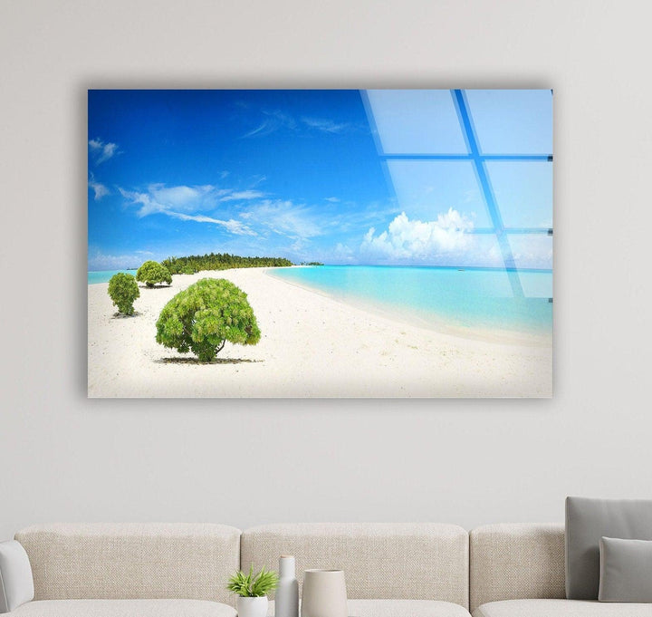 Luxury beach-themed glass wall art showcasing a tropical paradise with vibrant blue waters.
