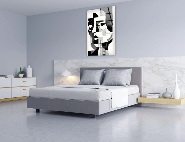 Abstract black and white face composition on glass blending curved shapes with structured grid patterns.